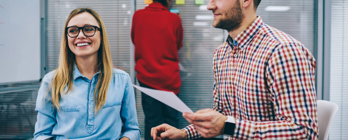 group-of-coworkers-talking-to-each-other-in-office-2023-11-27-04-58-31-utc